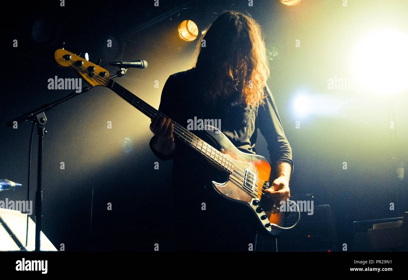 Nijmegen, The Netherlands - May 28, 2014. Bent Saether, bass guitarist and lead vocalist of Norwegian rock band Motorpsycho, on stage. Stock Photo