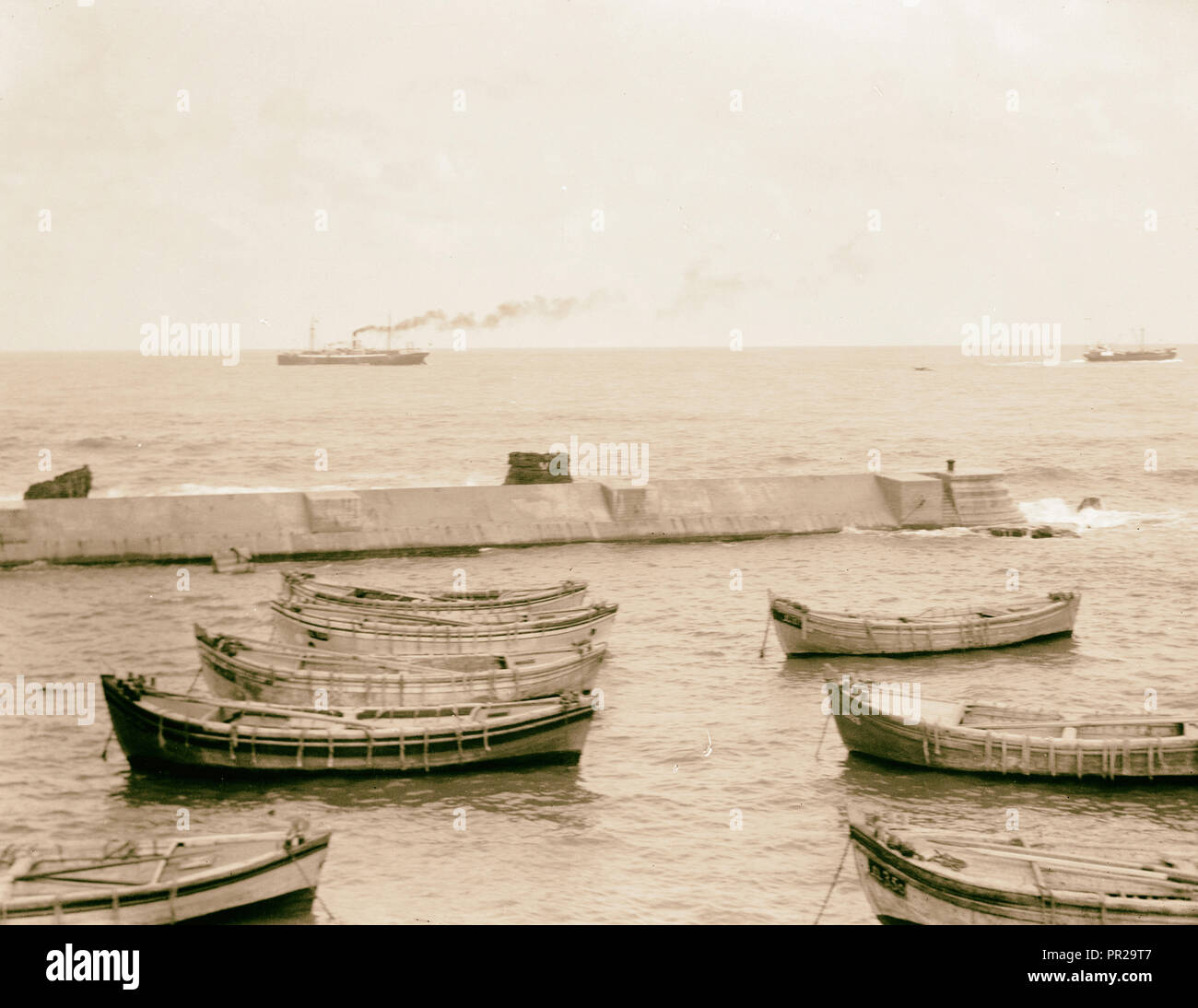 Palestine disturbances 1936. Freight boat leaving Jaffa harbour to be ...