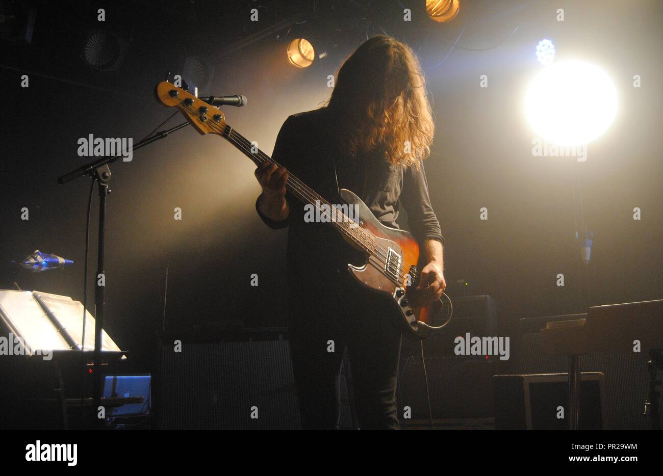 Nijmegen, The Netherlands - May 28, 2014. Bent Saether, bass guitarist and lead vocalist of Norwegian rock band Motorpsycho, on stage. Stock Photo