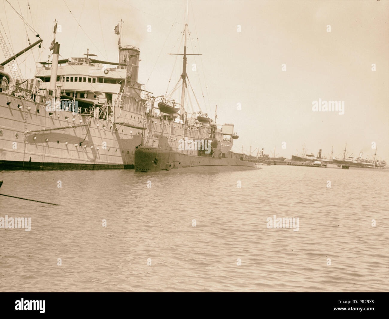 Palestine disturbances 1936. The British Transport ship 'Dorsetshire' tied up in the Haifa harbour. 1936, Israel, Haifa Stock Photo