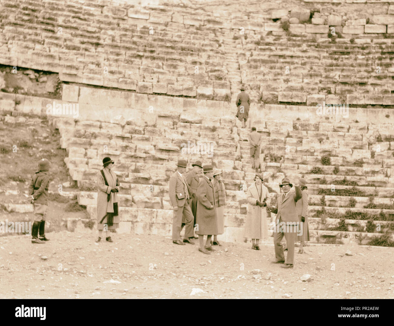 Visit of H.R.H. the Crown Prince of Sweden in December 1934. The Prince & his party in the Roman theatre of Amman. 1934, Jordan Stock Photo