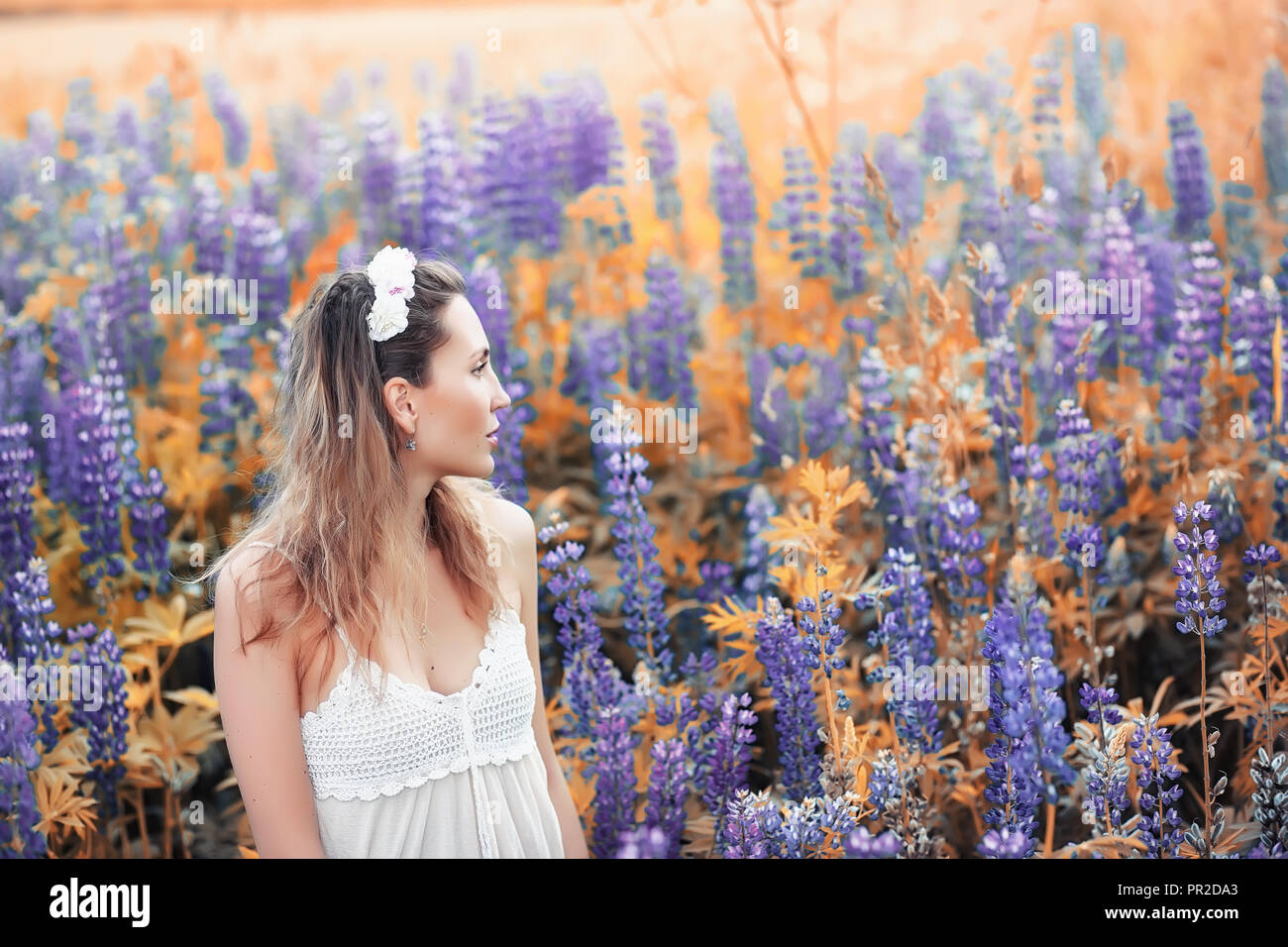 Girl with a bouquet of flowers in autumn Stock Photo - Alamy