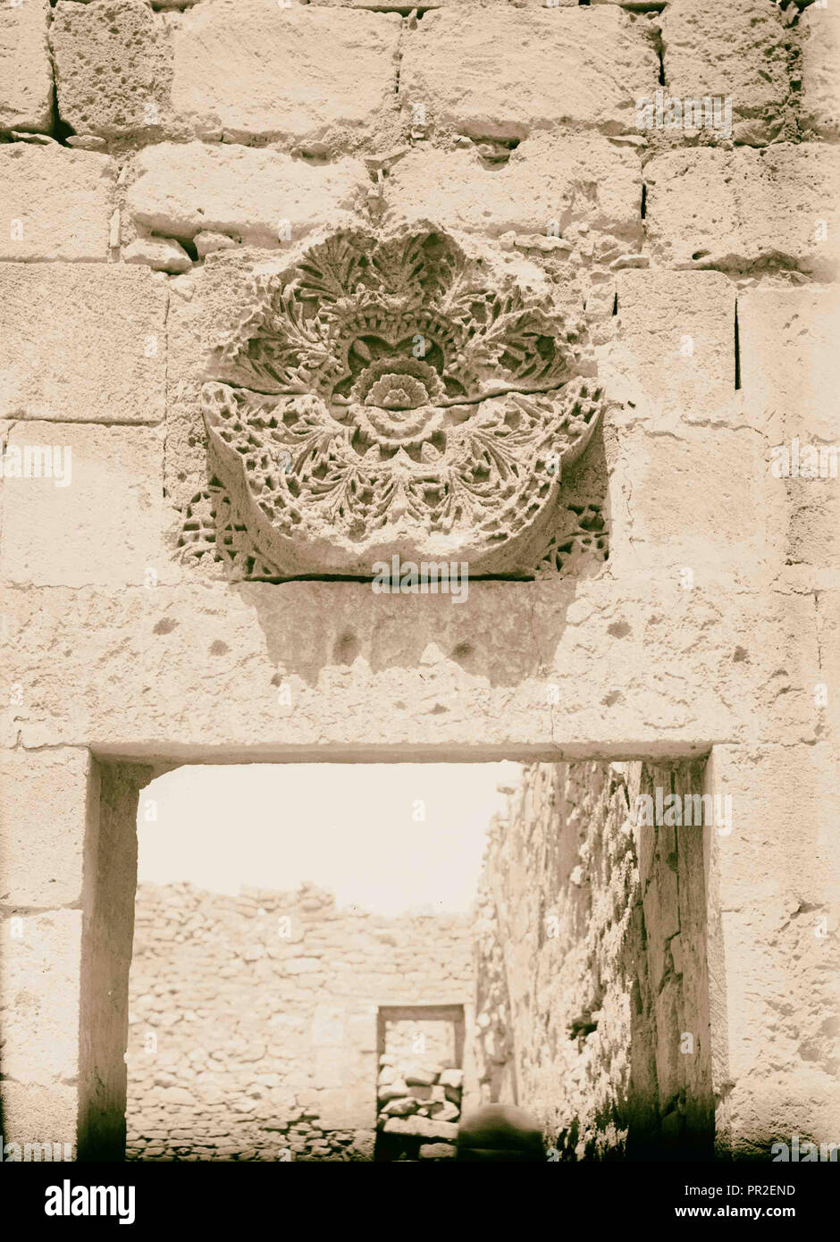 East of the Jordan and Dead Sea. Beautifully carved rosette, Mashita [i.e., Mshatta]. 1900, Jordan Stock Photo