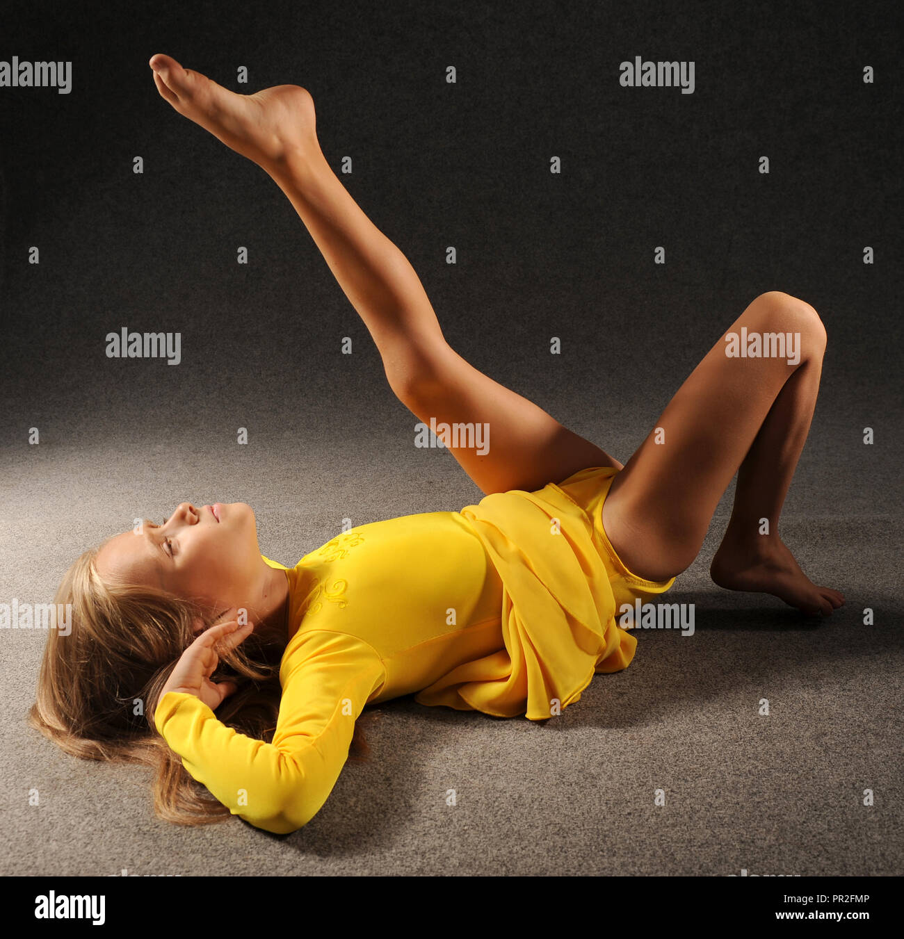 Little girl lifting dress hi-res stock photography and images - Alamy