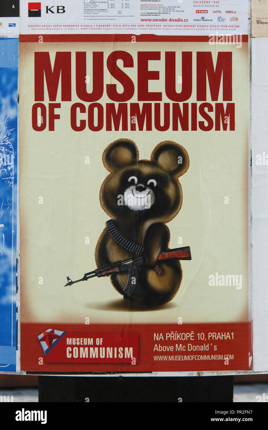 Olympic Mishka armed with the Kalashnikov depicted in the promotional poster of the Museum of Communism in Prague, Czech Republic. The Olympic Mishka designed by Russian books illustrator Victor Chizhikov was the mascot of the 1980 Moscow Olympic Games. Stock Photo