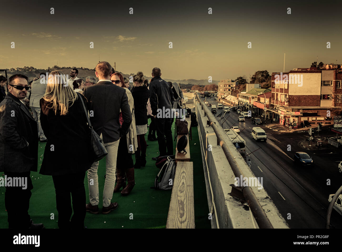 A wedding party celebrates on the roof of the Troyeville Hotel in east Johannesburg, South Africa Stock Photo