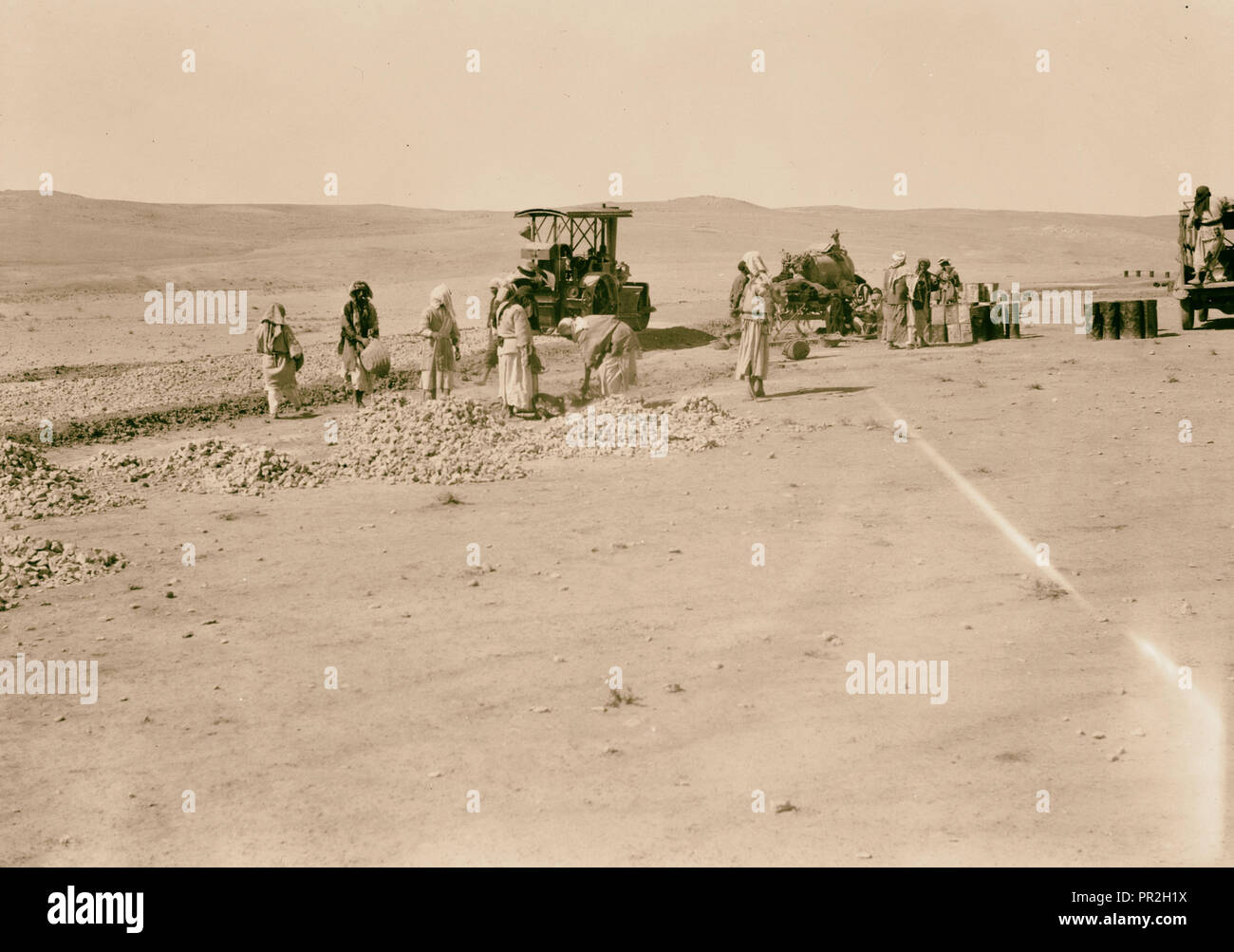 Iraq, Gayara bitumen, men and machinery. 1932, Iraq, al-Qayyarah, Al ...