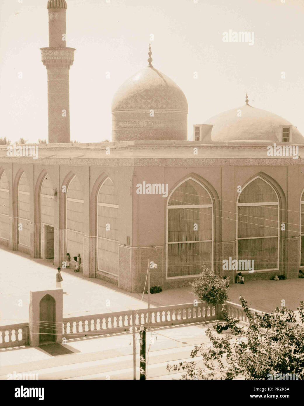 Iraq. (Mesopotamia). Baghdad. Views, street scenes, and types. Modern mosque and school. Covered with the typical blue tiles Stock Photo