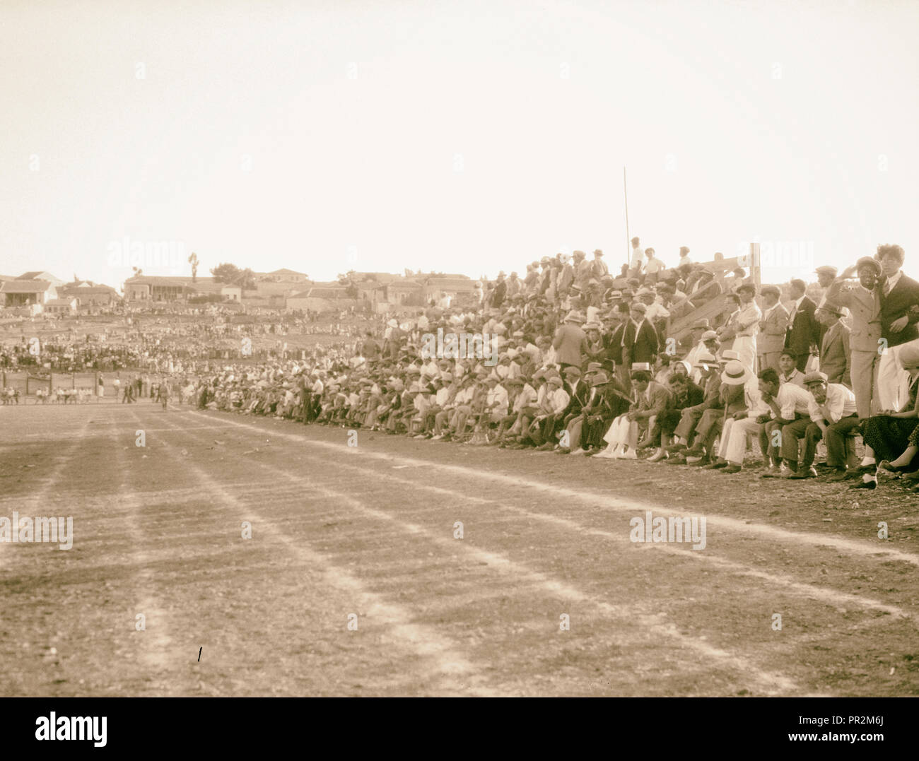 Maccabee football game on sports grounds near el-Bokharbia, crowds on ground stands. 1934, Middle East, Israel and/or Palestine Stock Photo