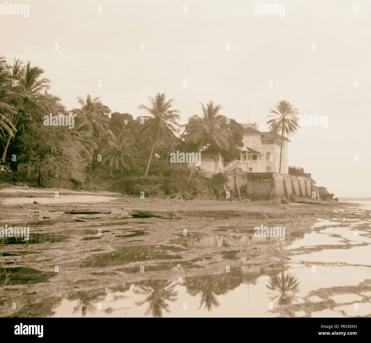 A seaside palace of the Sultan. View along sea front. 1936, Zanzibar, Tanzania Stock Photo