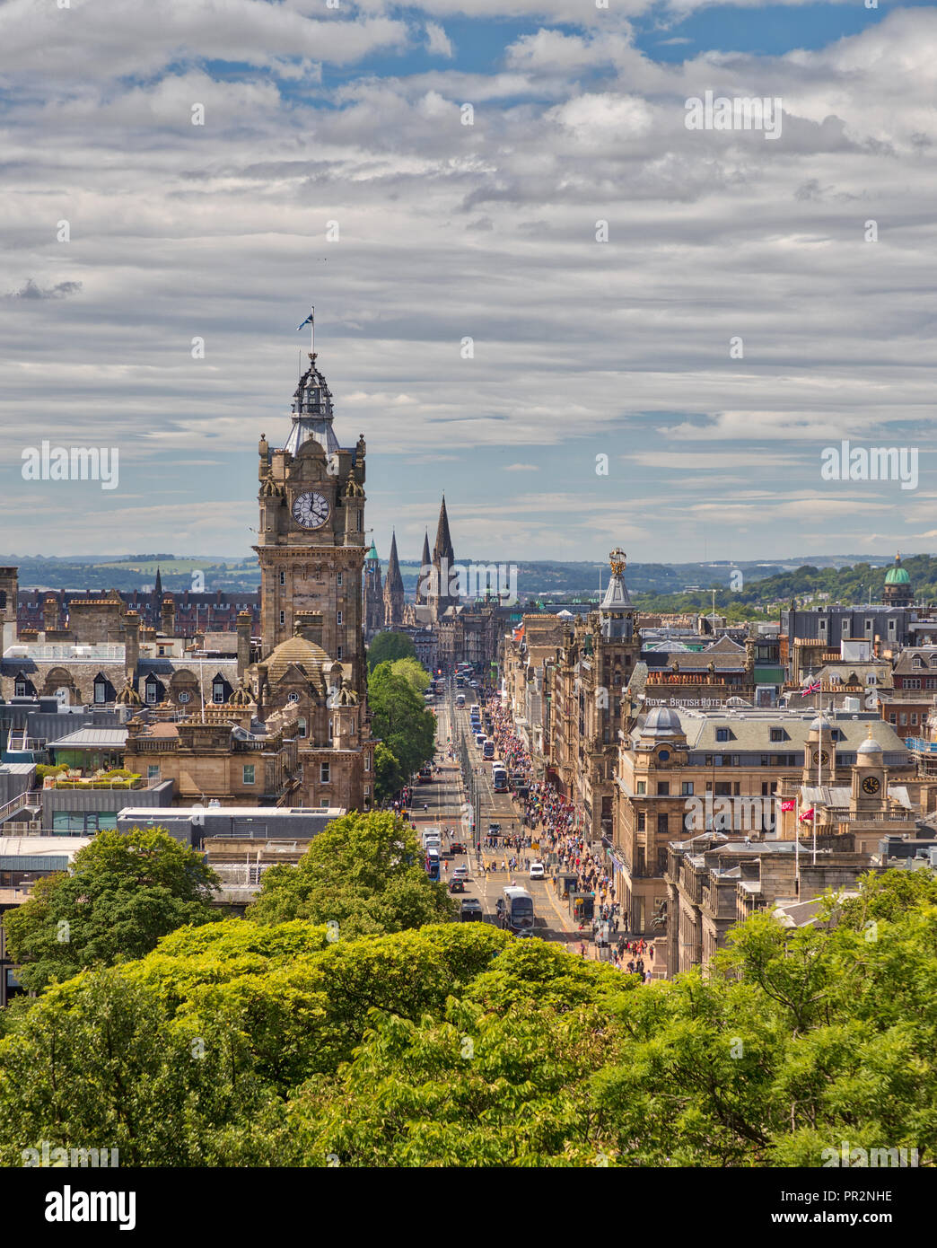 View from Calton Hill of busy Princes Street in Edinburgh, Scotland with a blue sky and white clouds Stock Photo