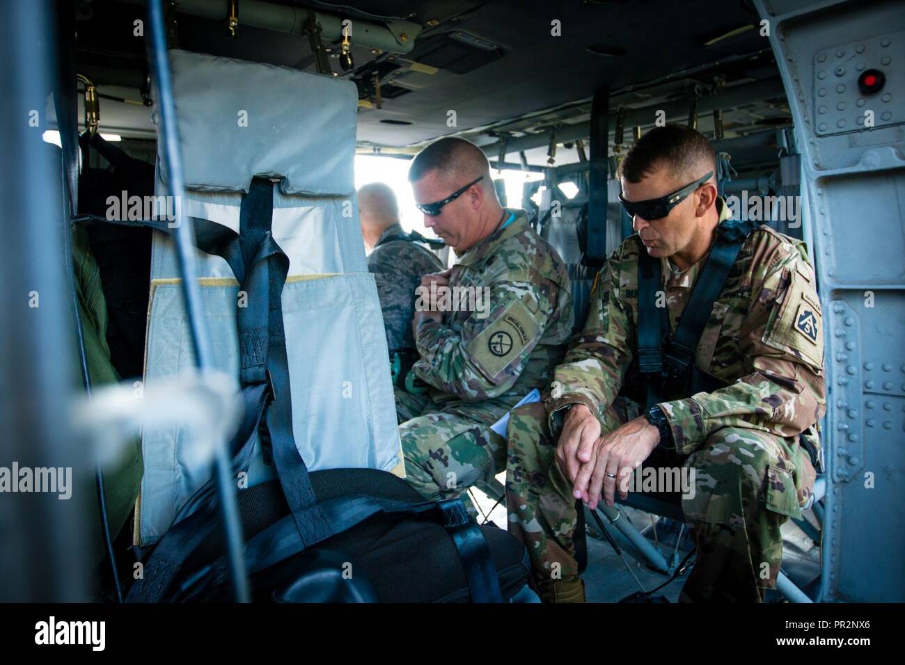 Lt. Gen. Jeffrey S. Buchanan (right), commander of U.S. Army North (Fifth Army), and Maj. Gen. James A. Hoyer (left), the adjutant general of the West Virginia National Guard, prepare for a ride in a UH-60 Black Hawk Helicopter to review the 2017 National Jamboree at the Summit Bechtel Reserve near Glen Jean, W.Va., July 25, 2017. More than 30,000 scouts, troop leaders, volunteers and professional staff members, as well as more than 15,000 visitors are expected to attend the 2017 National Jamboree. Approximately 1,200 military members from the Department of Defense. U.S. Coast Guard and Nation Stock Photo