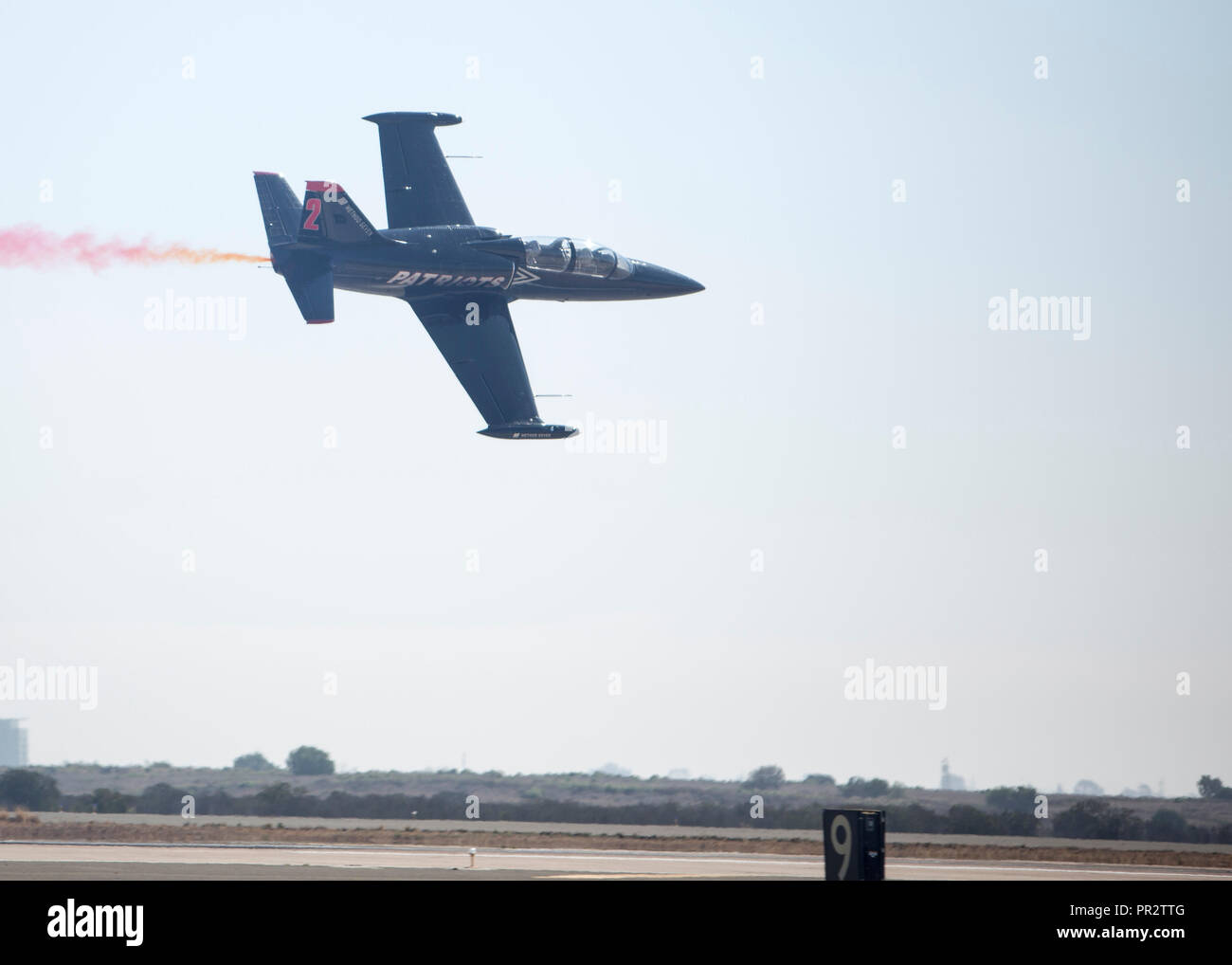 The Patriots Jet Team performs a 26-minute aerobatic flying routine in their aircraft, the L-39 Albatross, during the 2018 Marine Corps Air Station Miramar Air Show at MCAS Miramar, Calif., Sept. 28. This year's air show honors '100 years of women in the Marine Corps' by featuring several performances and displays that highlight accomplishments and milestones women made since the first female enlistee, Opha May Johnson, who joined the service in 1918.(U.S. Marine Corps photo by Lance Cpl. Samuel Ruiz) Stock Photo