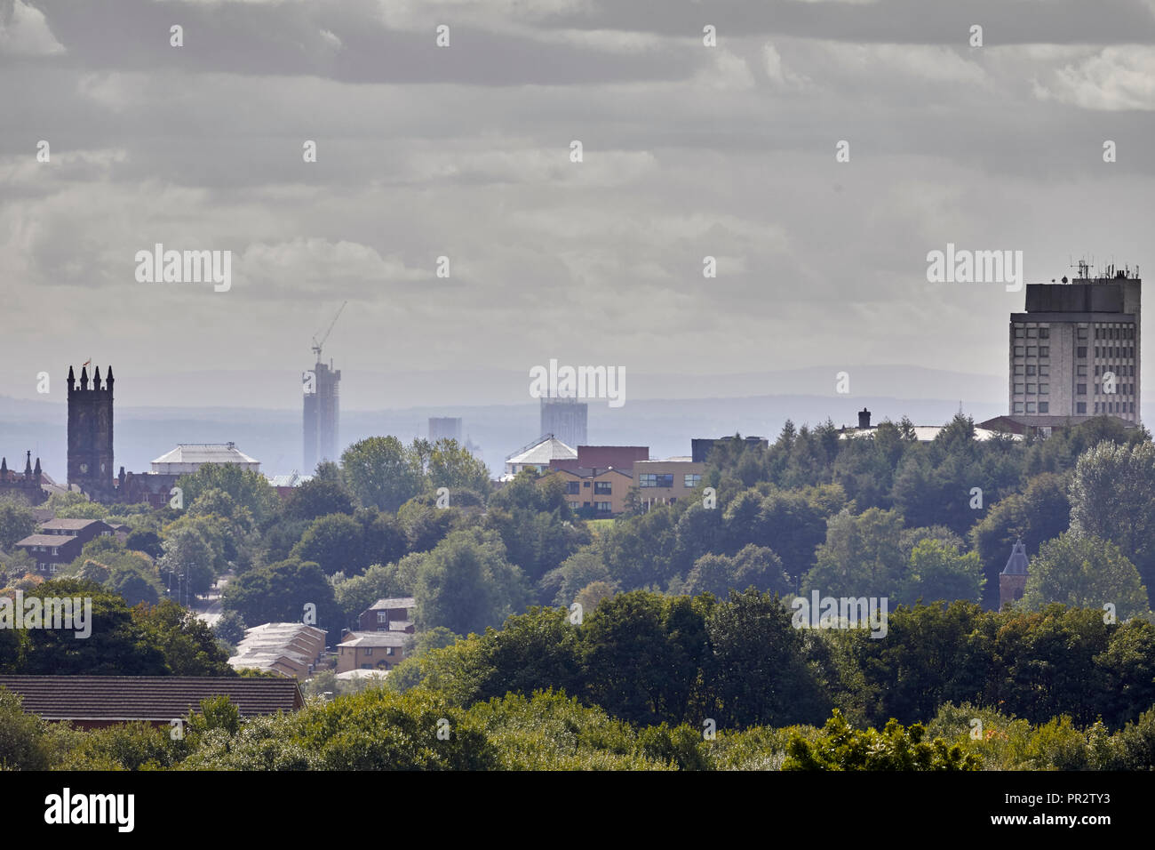 Deansgate Square skyscraper cluster development in manchester seen from  Metropolitan Borough of Oldham, Greater Manchester, England Stock Photo