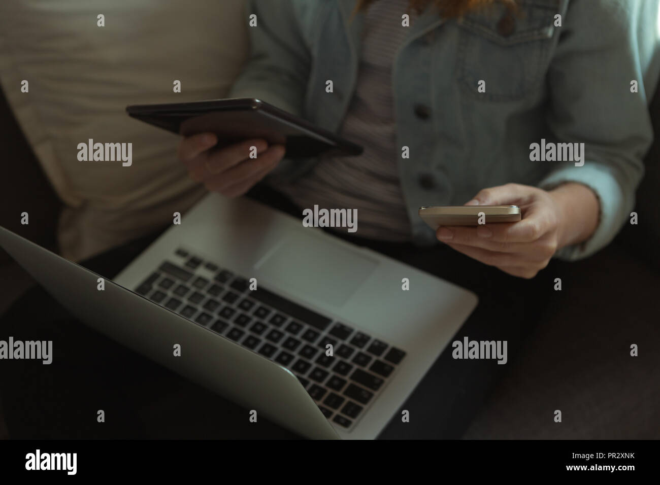 Jewelry designer using electronic devices at home Stock Photo Alamy