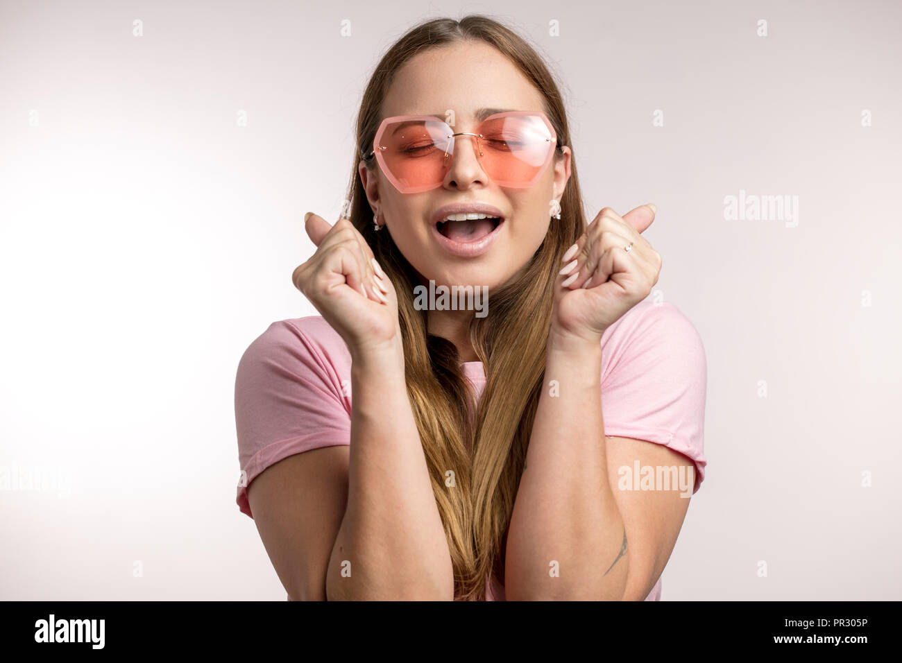 emotional hipster girl is singing with closed eyes Stock Photo Alamy