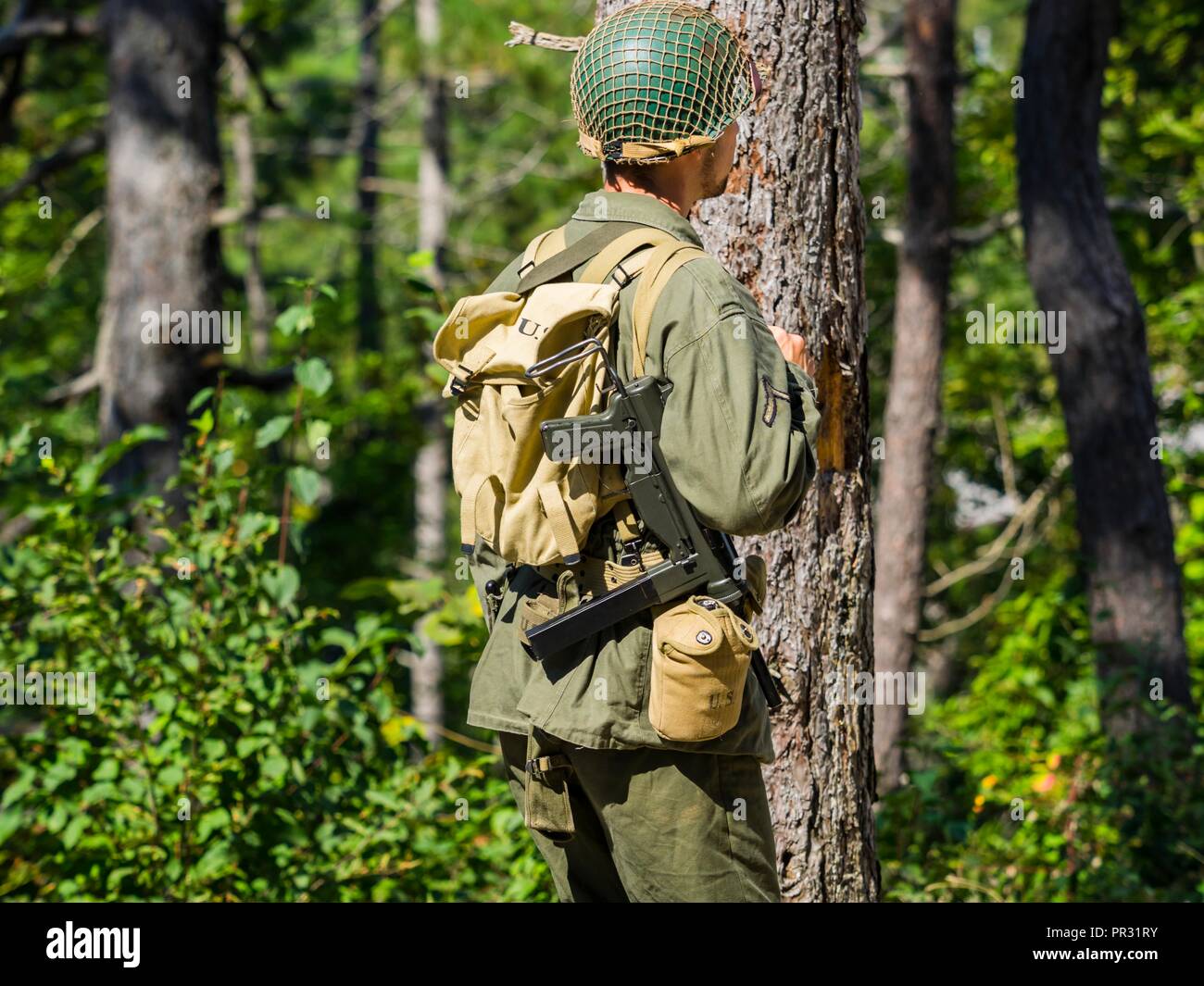 m3-submachine-gun-ww2-era-historical-history-renovated-in-pivka-museum-slovenia-soldier-looking-away-PR31RY.jpg