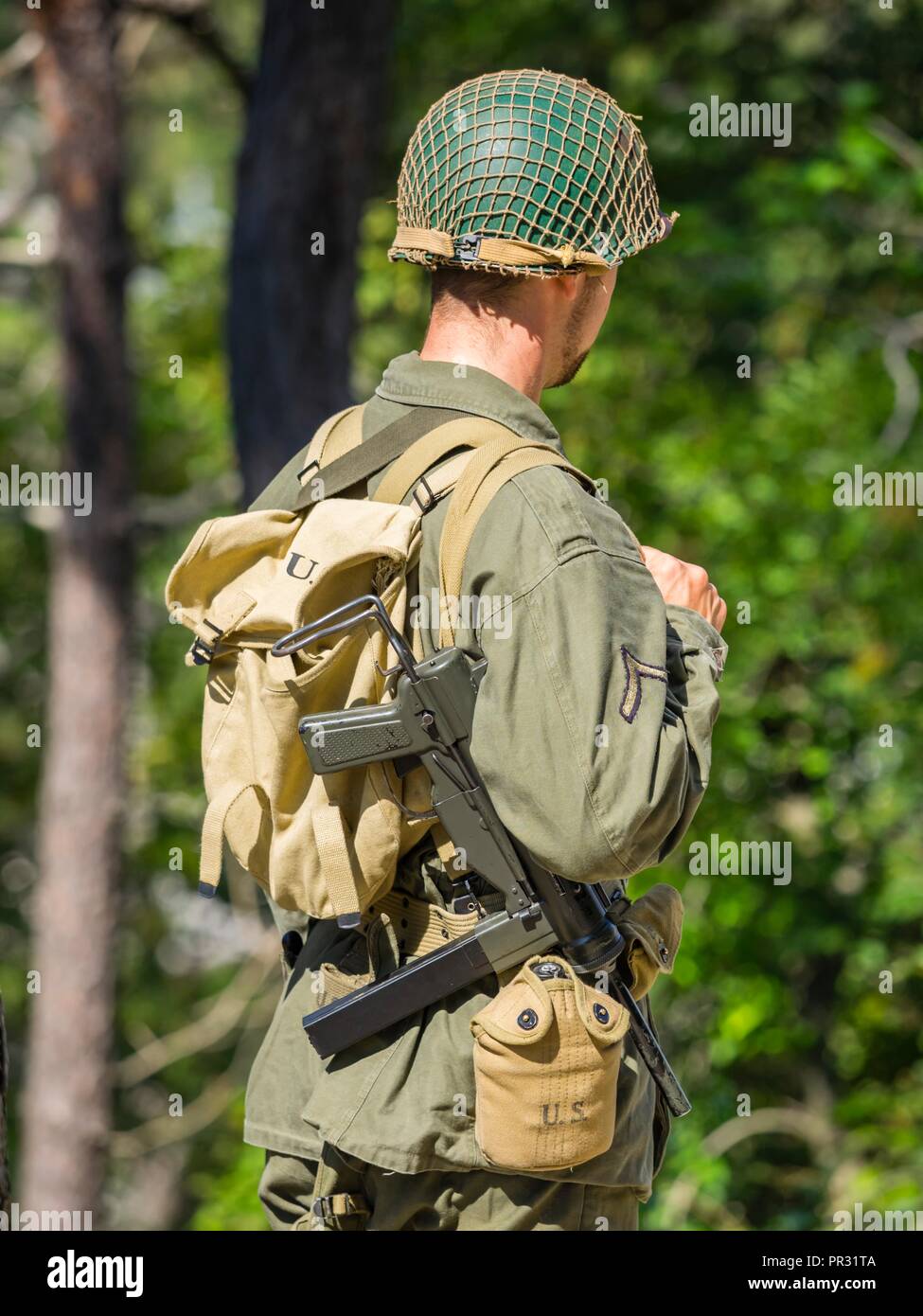 M3 submachine gun WW2 era historical history renovated in Pivka Museum Slovenia soldier looking away Stock Photo