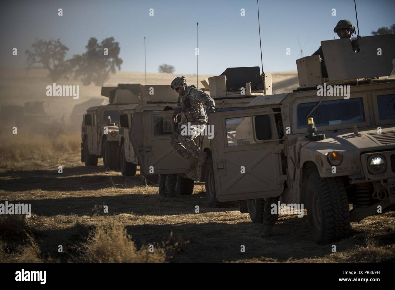 Jury Rigging Humvee A U.S. Army Reserve military police gunner dismounts a humvee before a ...