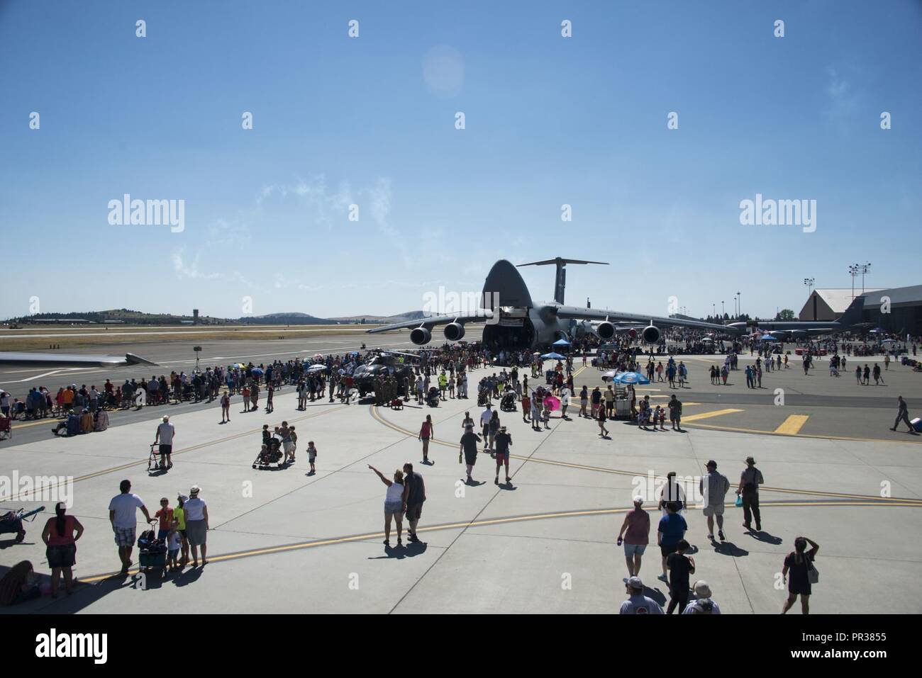 Service members and members from the local community gathered at Fairchild Air Force Base, Washington, during the SkyFest 2017 Air Show and Open House at Fairchild Air Force Base, Washington, July 29, 2017. SkyFest is Fairchild’s air show and open house to give the local and regional community the opportunity to view Airmen and our resources. Stock Photo