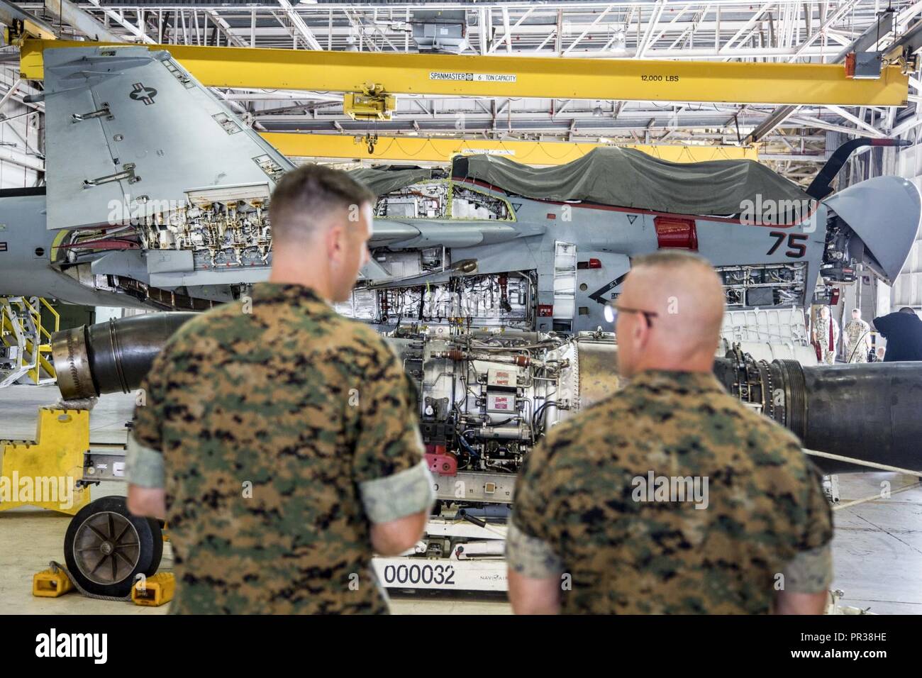 Ryan Rundle Marine U.S. Marine Corps Lt. Col. Andrew Rundle, left, commanding officer of ...