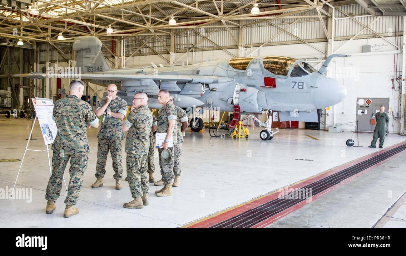 U.S. Marine Corps Lt. Col. Andrew Rundle, left, commanding officer of ...