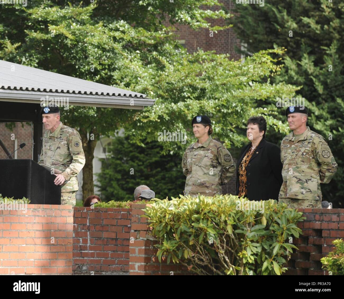 Colonel Daniel S. Morgan relinquishing Garrison Command of Joint Base Lewis-McChord to Colonel Nicole M. Lucas, at the 28 July 2017 Change Of Command on Watkins Field, JBLM Lewis Main. Director of Installation Management Command (IMCOM) is Brenda Lee McCullough. Lt. Gen. Gary Volesky Commander of I Corps photographed. Stock Photo