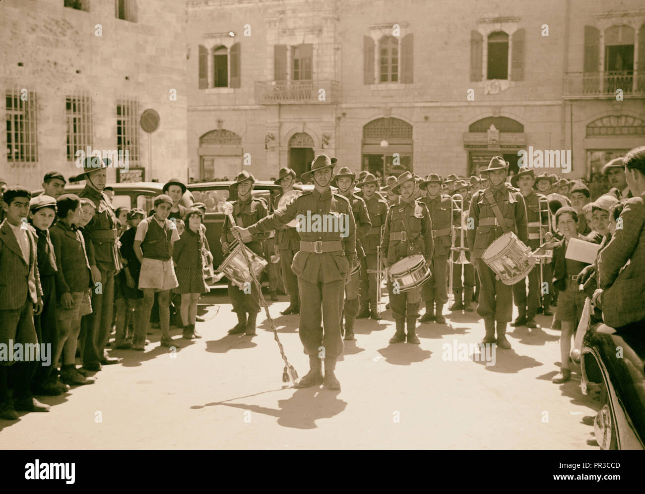 The Australian Band leading a parade of Australian soldiers in Jerusalem. 1940, Jerusalem, Israel Stock Photo