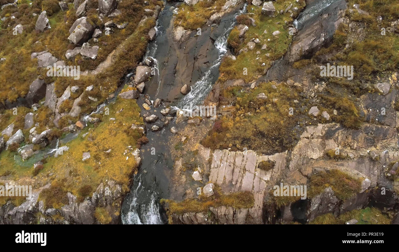 Aerial view over Torc Waterfall at Connor Pass on Dingle Peninsula in
