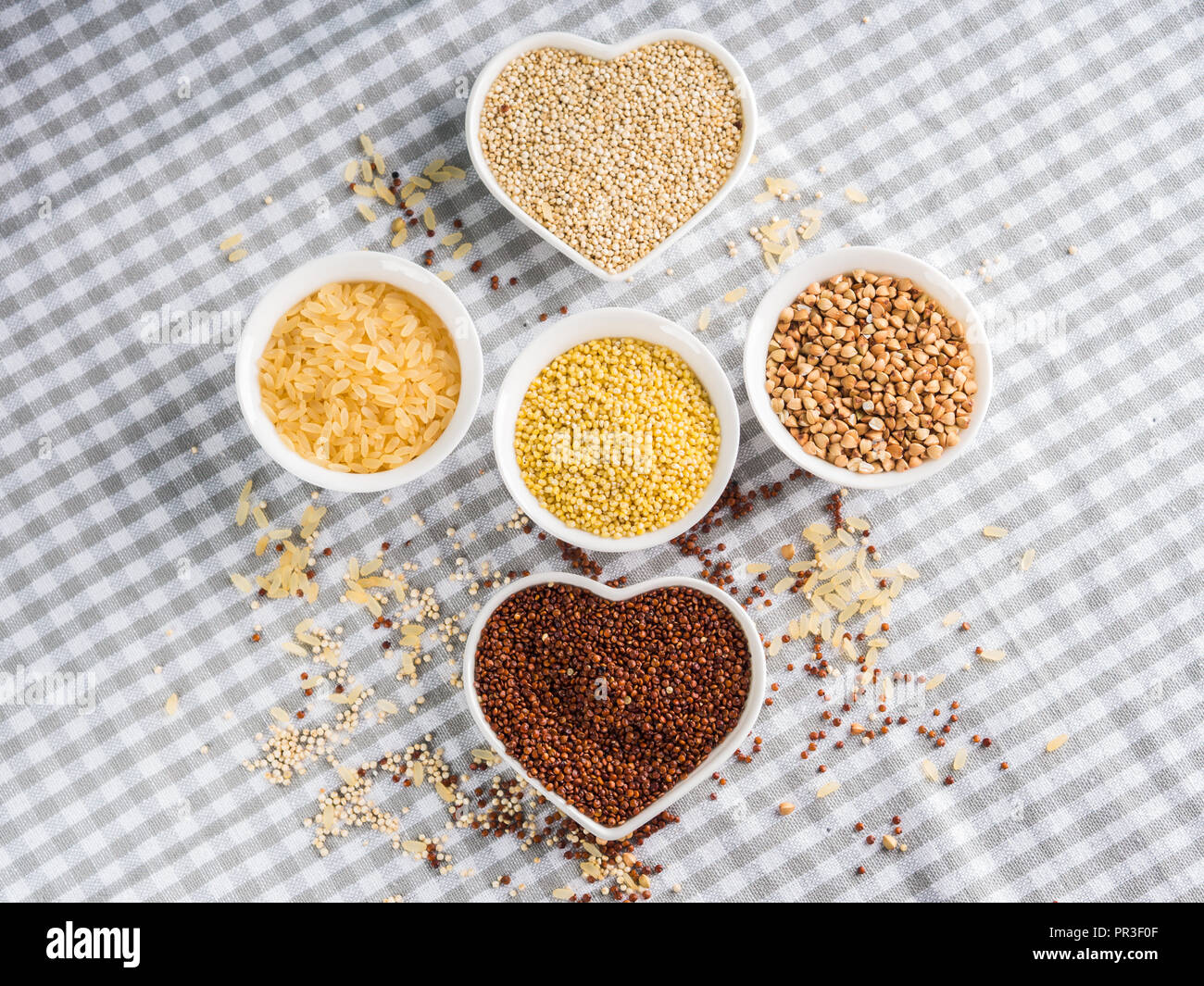 Gluten free grains quinoa, rice, buckwheat, amaranth, millet in bowls