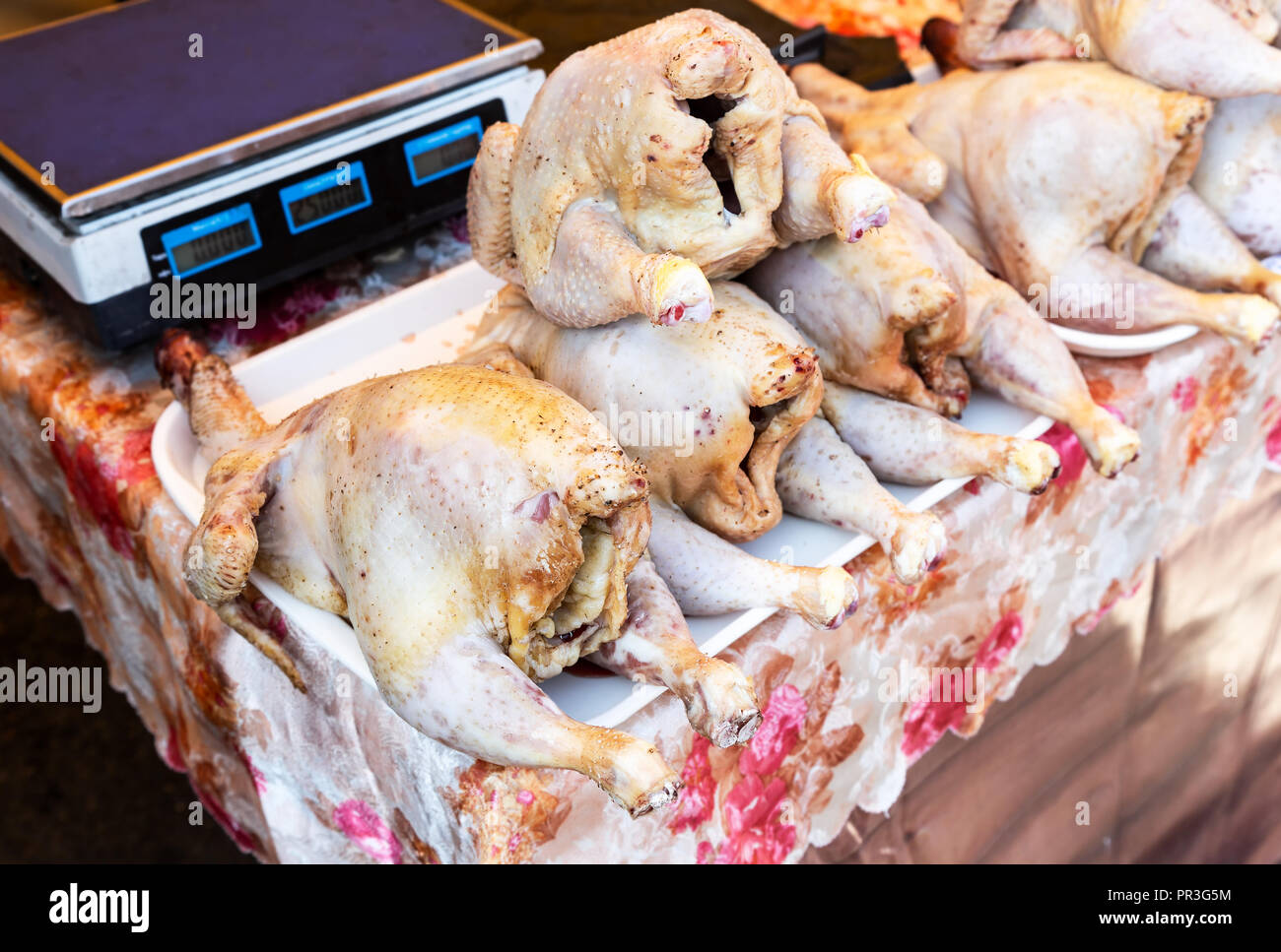Fresh raw chicken meat ready for sale at the farmers market Stock Photo