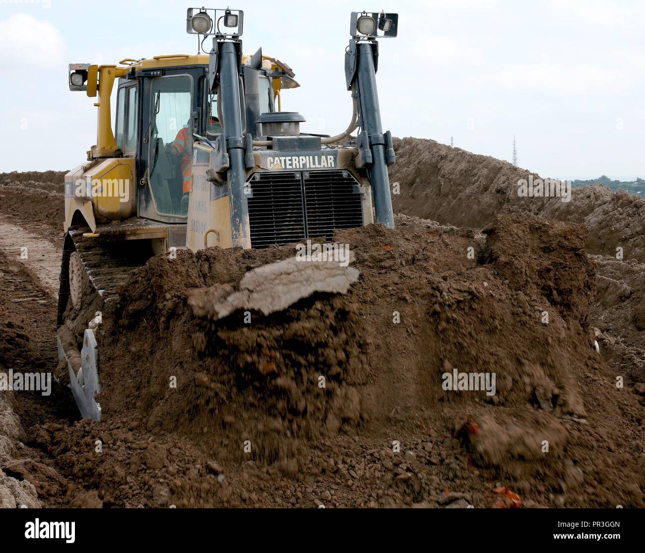 A Caterpillar D8T Bulldozer fitted with a semi universal blade and