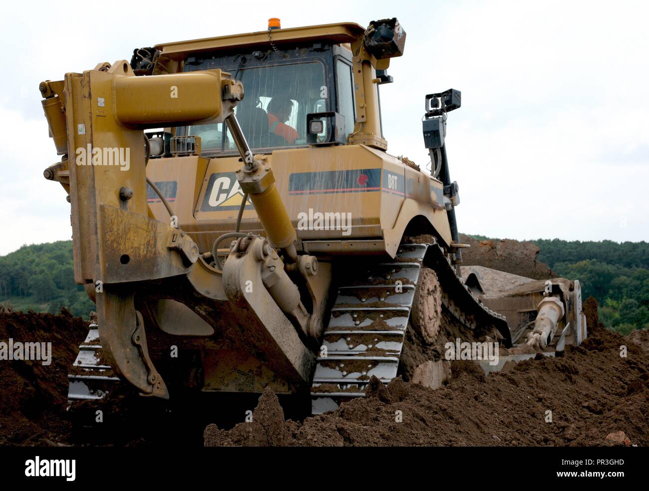 A Caterpillar D8T Bulldozer fitted with a semi universal blade and