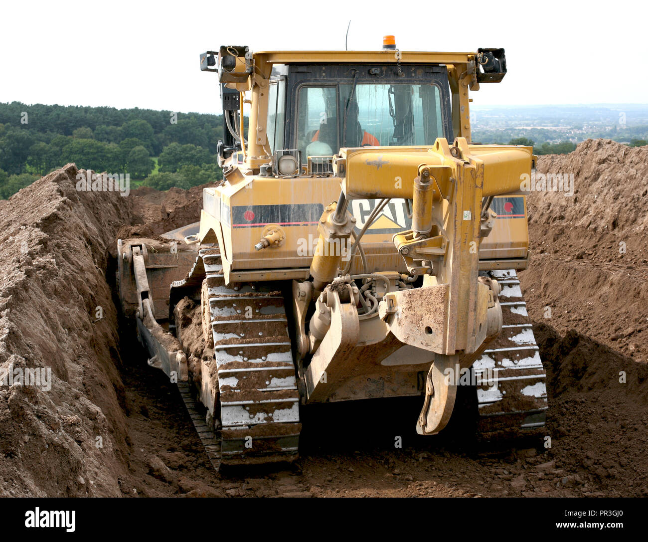 A Caterpillar D8T Bulldozer fitted with a semi universal blade and
