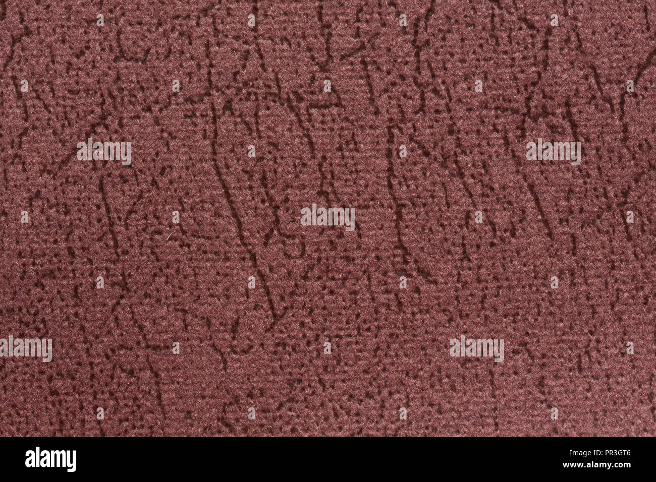 Simple classic textile background in dark pink hue. Stock Photo