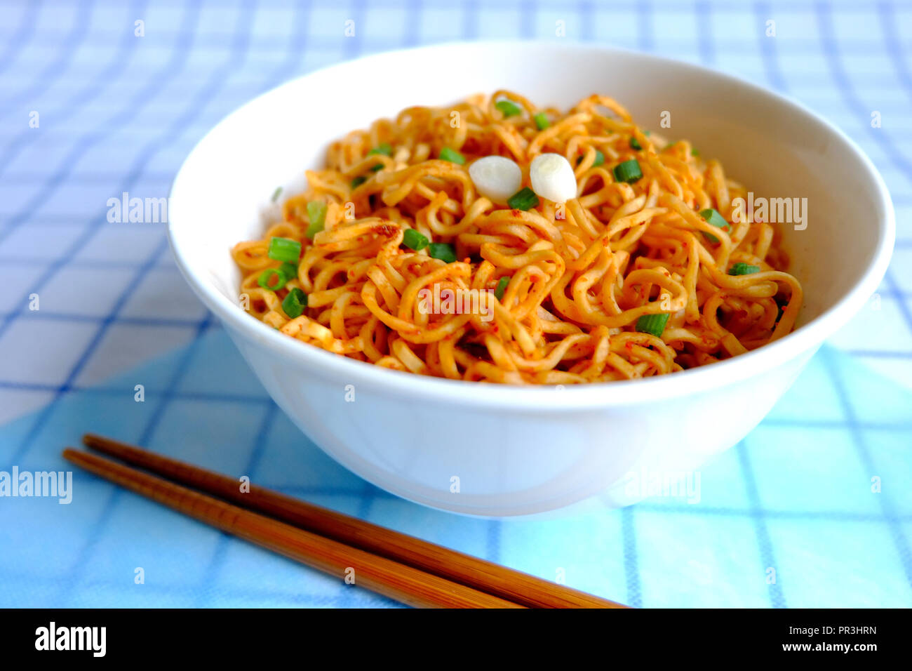 Instant noodle in white ceramic bowl on napery Stock Photo Alamy