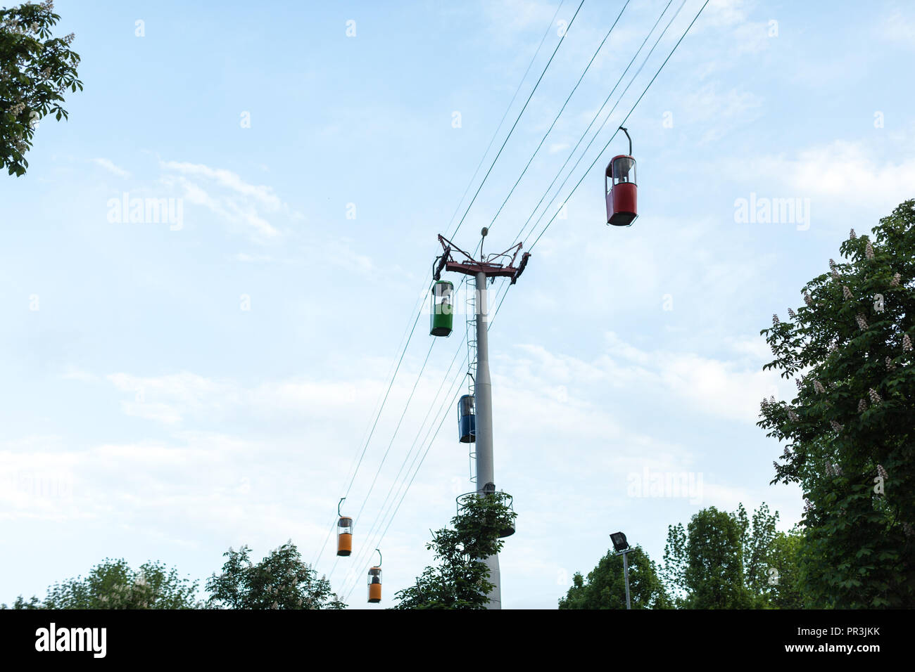 Cabin of the cable car against blue sky Stock Photo - Alamy