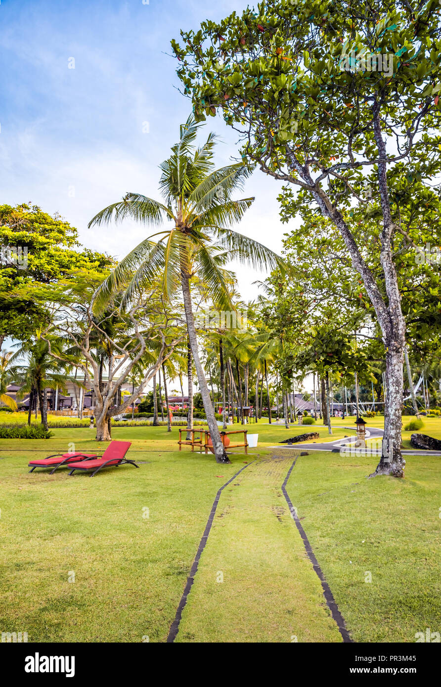 Resort recreation area on balinese shore, Indonesia Stock Photo