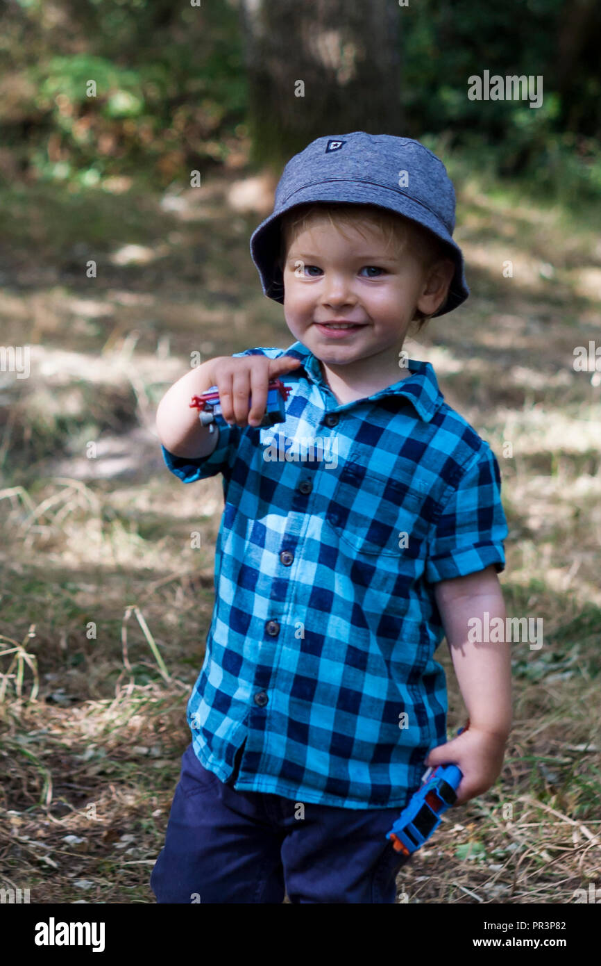 Happy little boy smiling for the camera. MODEL RELEASED Stock Photo - Alamy