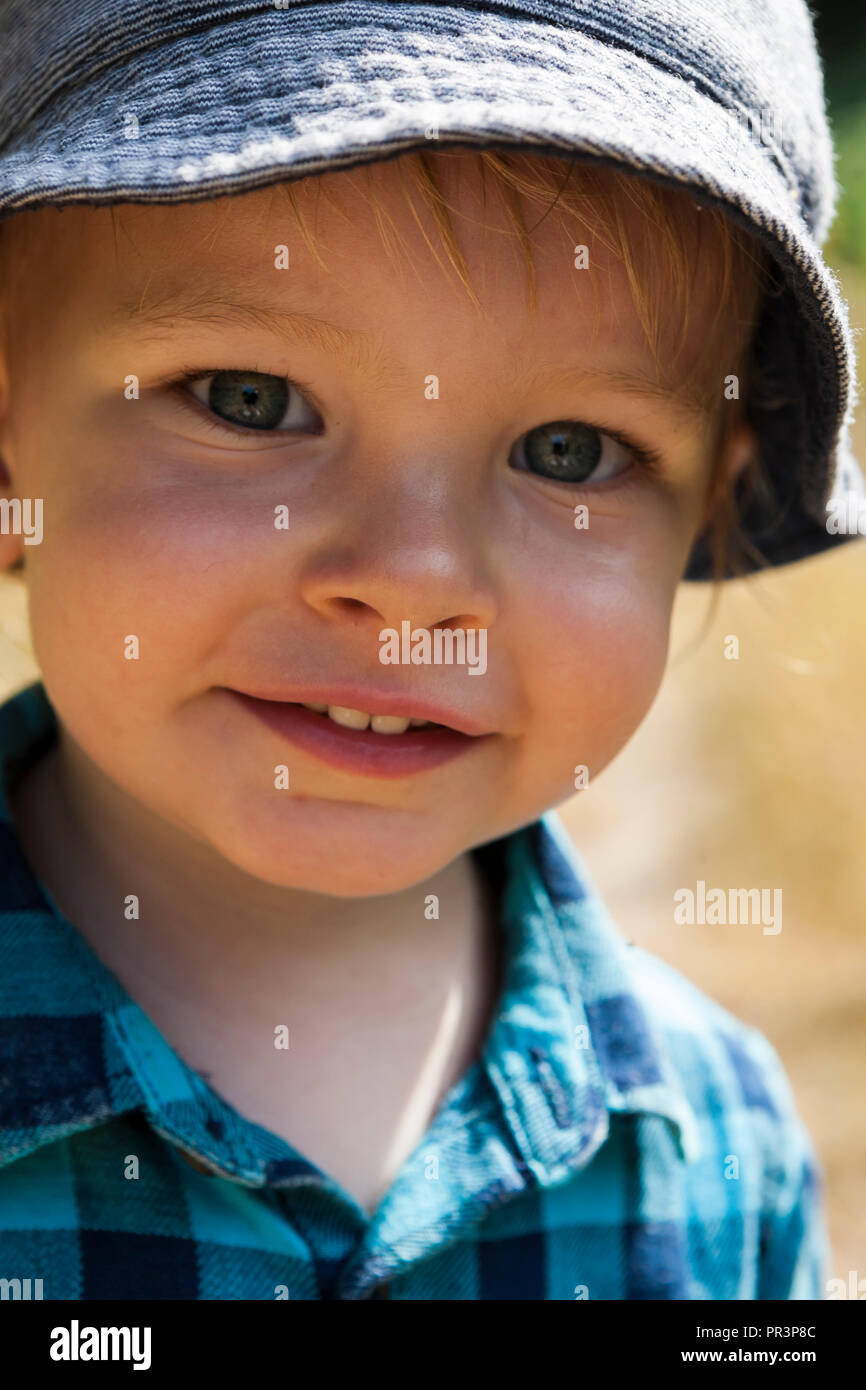 Happy little boy smiling for the camera. MODEL RELEASED Stock Photo - Alamy