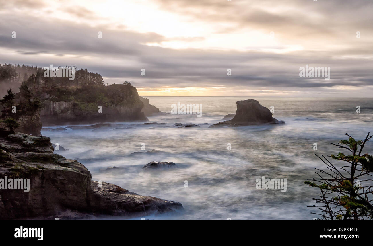 A view of the rocks of Cape Flattery, WA at sunset. Taken with a 10-stop ND-filter. Stock Photo