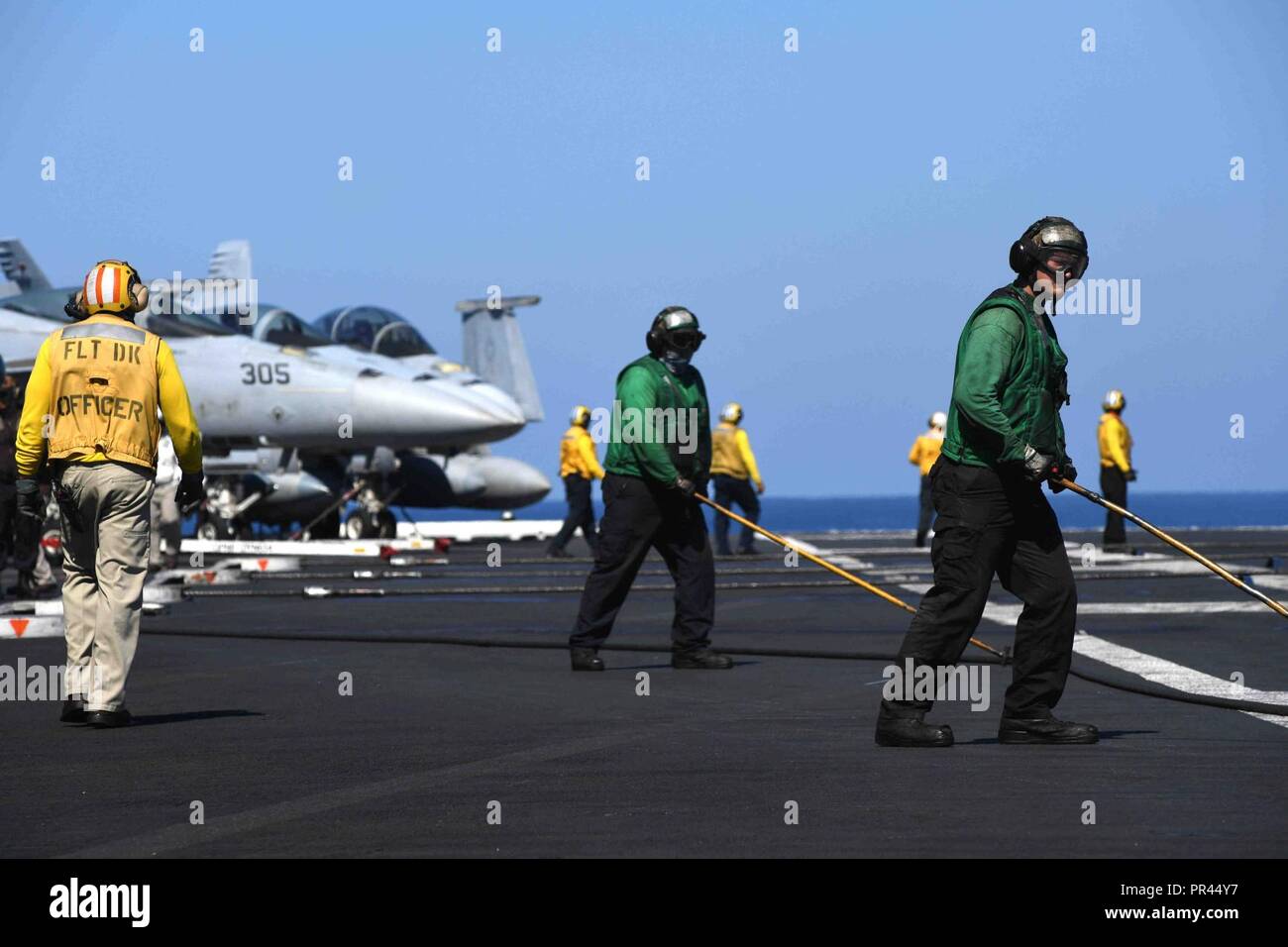 ATLANTIC OCEAN (Sept. 6, 2018) Sailors assist with retracting the trap ...