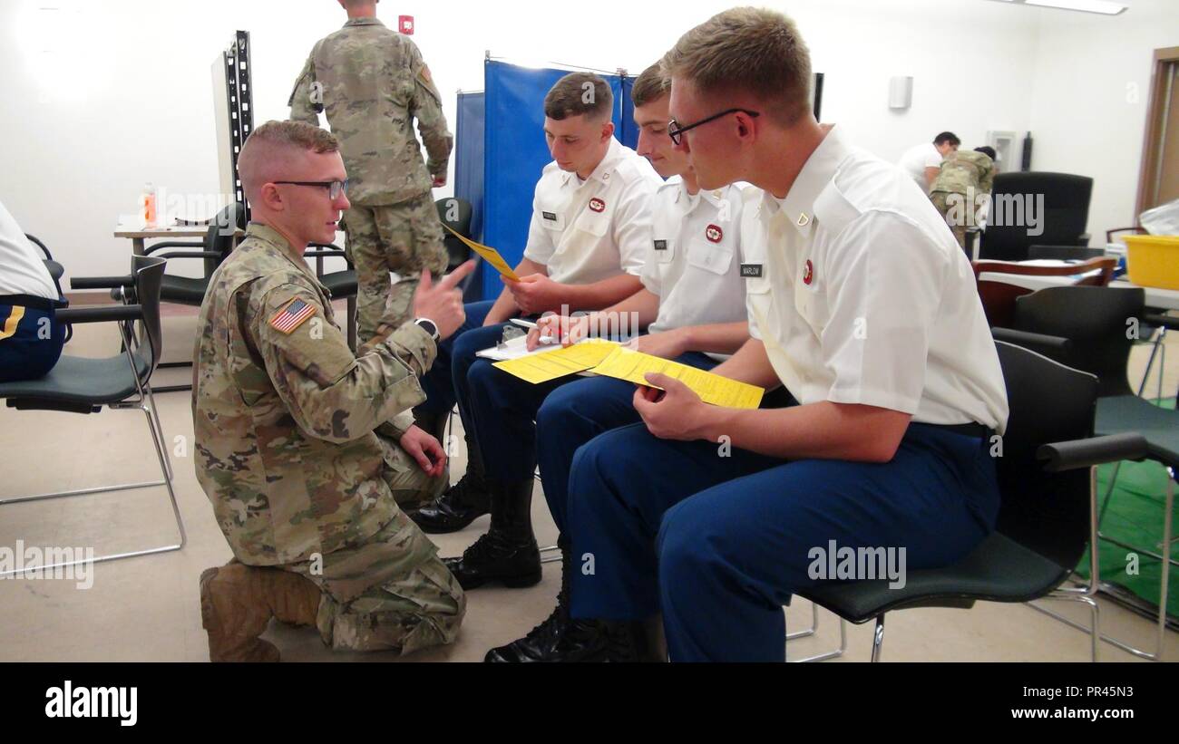 On Friday, 7 September, members of the 2/319 Field Artillery BDE, 82nd ABN DVN, Lab techs from the 432nd Blood Support Detachment, 44 MED BDE, and members of the Ft Bragg Blood Donor Center assist each other in the screening of Global Response Force (GRF) personnel to determine eligibility as Fresh Whole Blood donors. The primary goal of this partnership was to determine how many donors possessed the much needed 'O- Blood' otherwise known as the Universal Donor. After blood collection, it will be tested for transfusion transmitted diseases, as well as a determination of titer status, so the gr Stock Photo