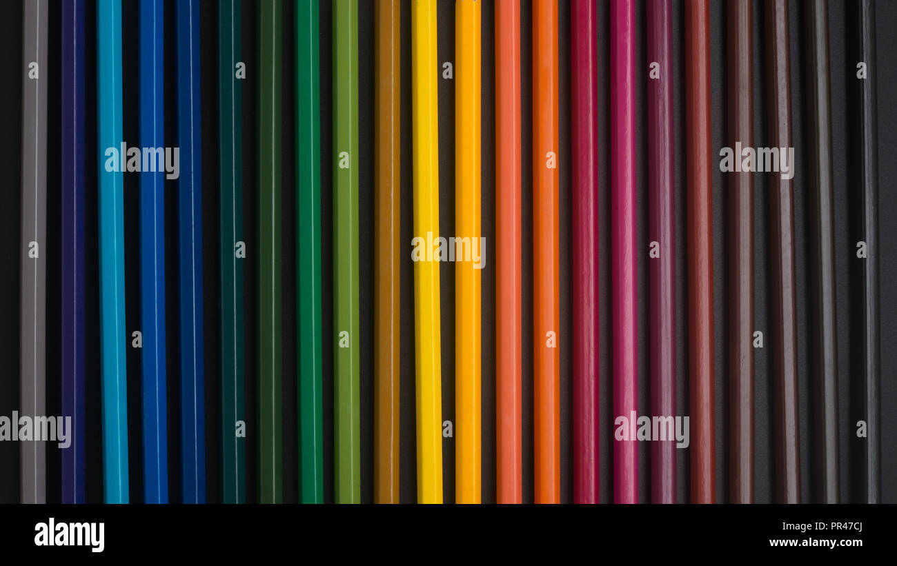 color pencils on black background close up Stock Photo - Alamy