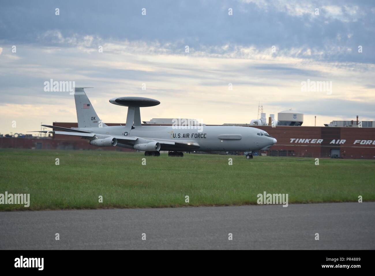 An E-3G Airborne Warning and Control System aircraft of the 552nd Air Control Wing, 960th Airborne Air Control Squadron, travels down the runway for a mission supporting the response to Hurricane Florence Sept. 15, 2018, Tinker Air Force Base, Oklahoma. The AWACS will provide air control and de-confliction service along the East Coast of the United States as they monitor and control airspace as local, state and federal assets move in to the area to conduct rescue and recovery operations. Stock Photo