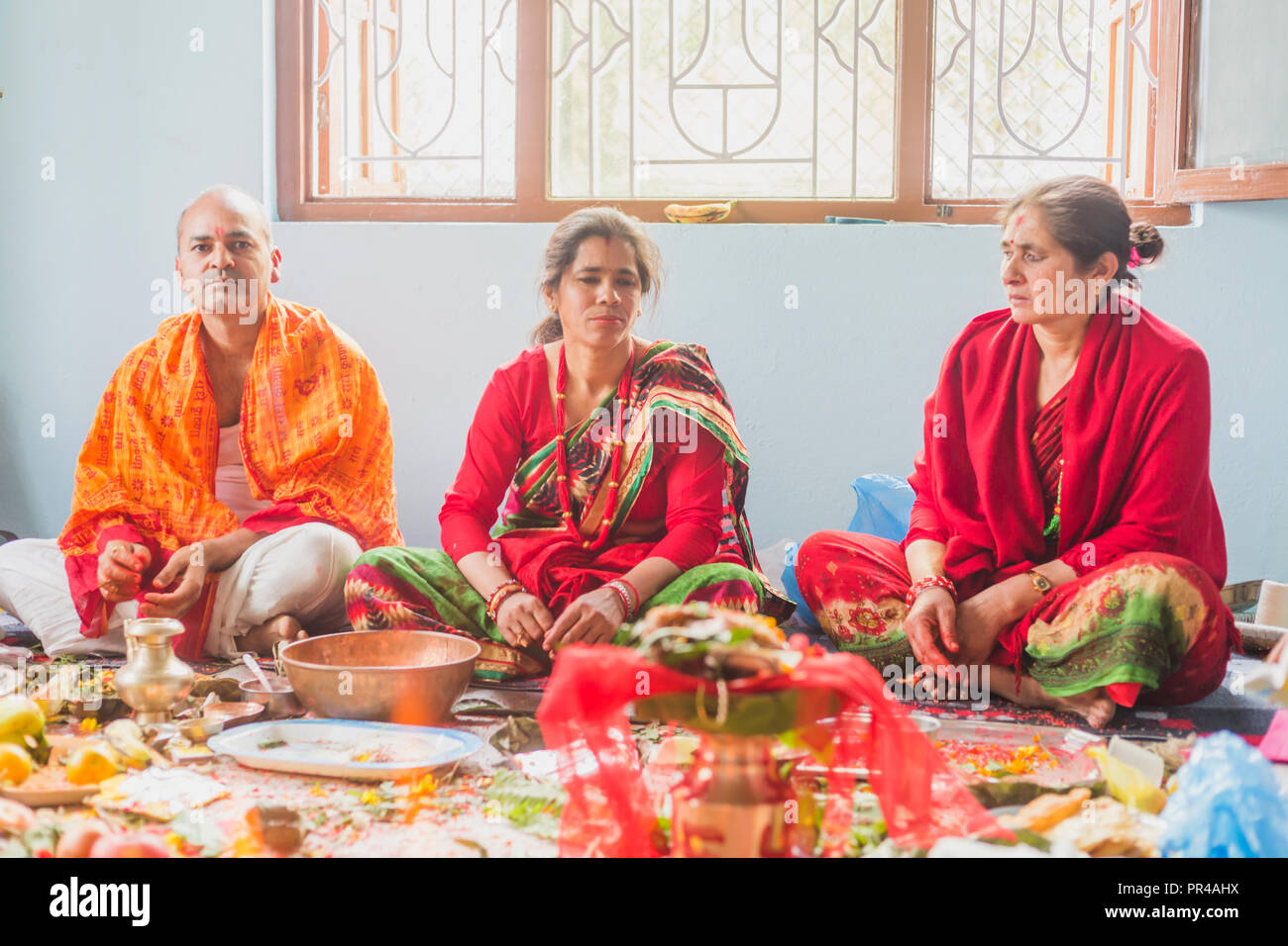 kathmandu,Nepal - Mar 10,2018: A Hindu Family Worshiping god at home ...