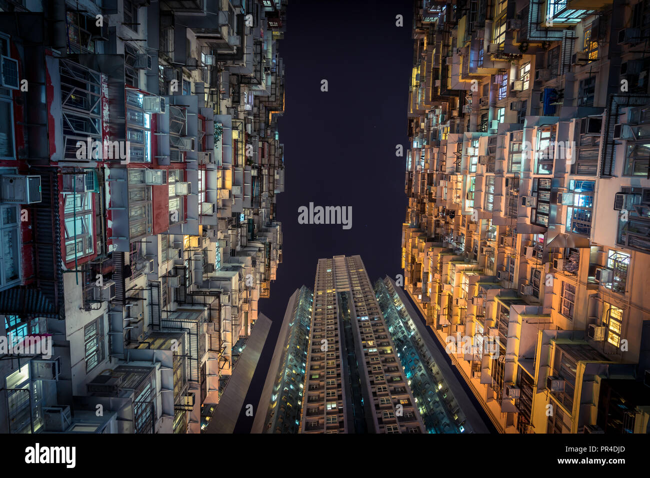 Looking up at apartment buildings in Hong Kong Stock Photo - Alamy