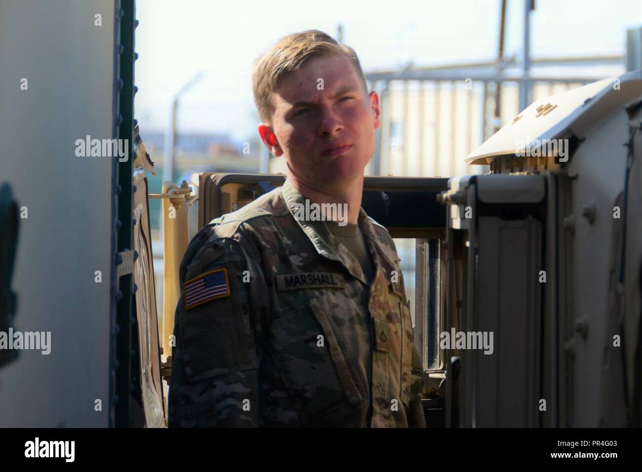 U.S. Army Pfc. Aaron Marshall, a wheeled vehicle mechanic (91B military