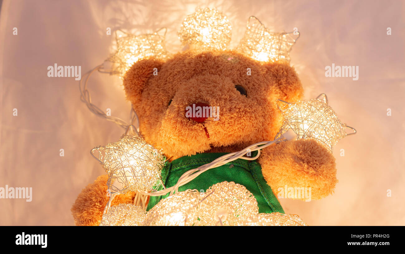 little doll bear with the colorful light Stock Photo