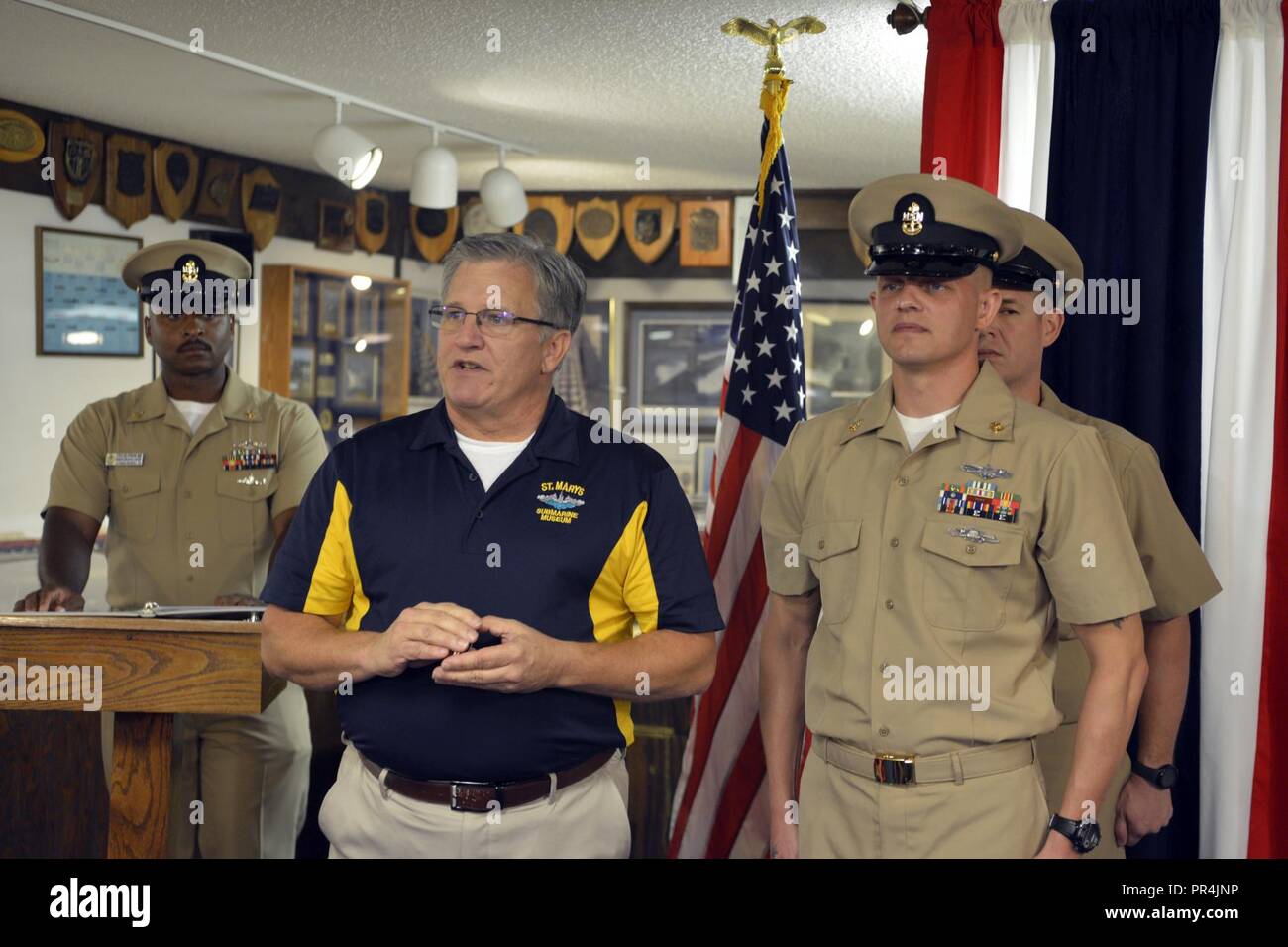 Mr. Keith Post, Executive Director, St. Marys Submarine Museum, addresses newly pinned chief